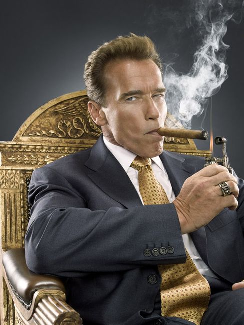 arnold schwarzenegger smoking a stogie